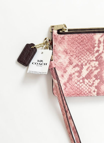 Coach snake skin Clutch in pink