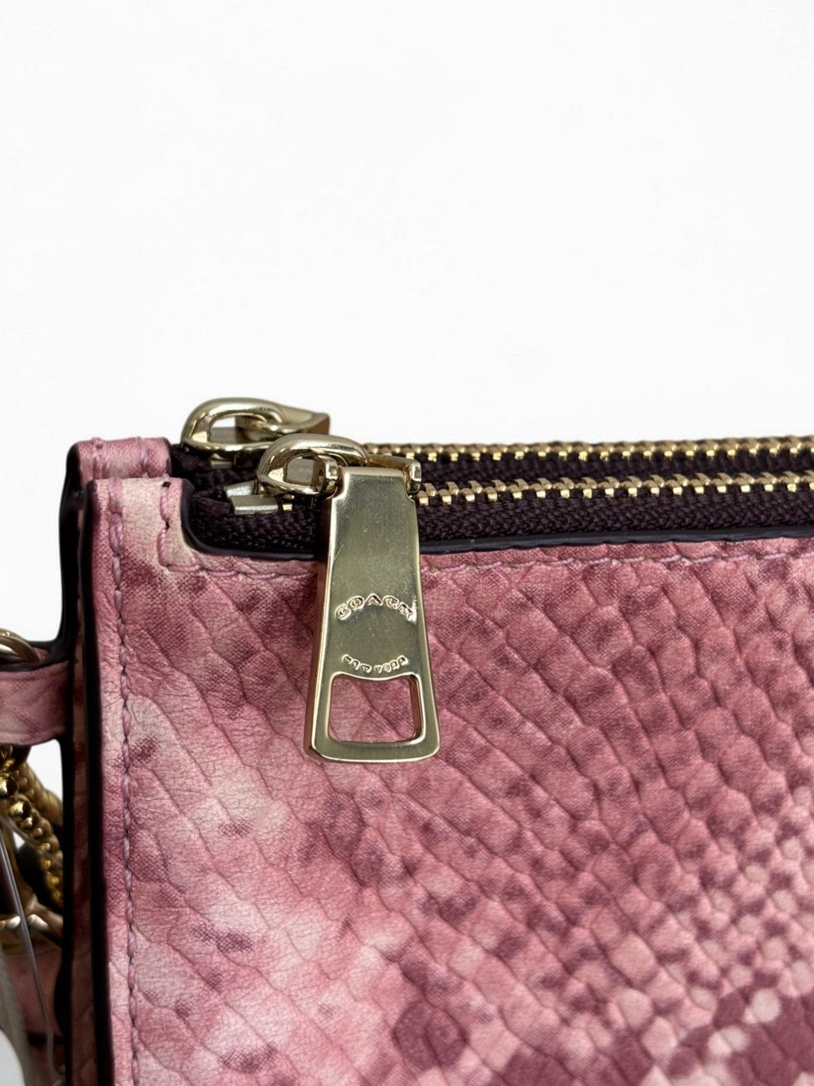 Coach snake skin Clutch in pink
