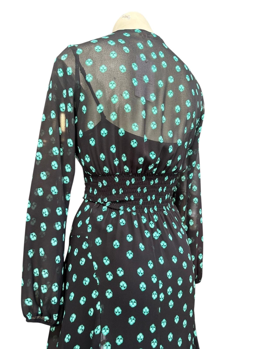 Maje black floral maxi dress, back view showing shirred waist and blouson sleeves