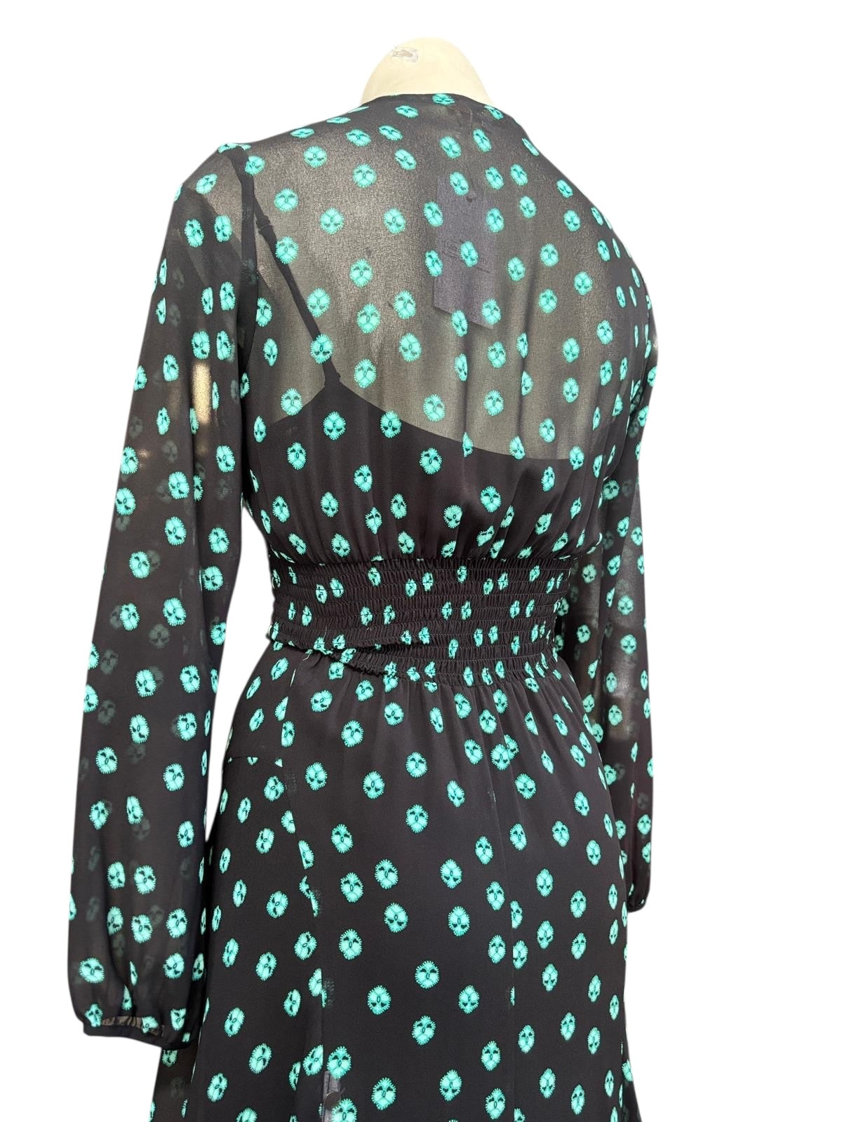 Maje black floral maxi dress, back view showing shirred waist and blouson sleeves