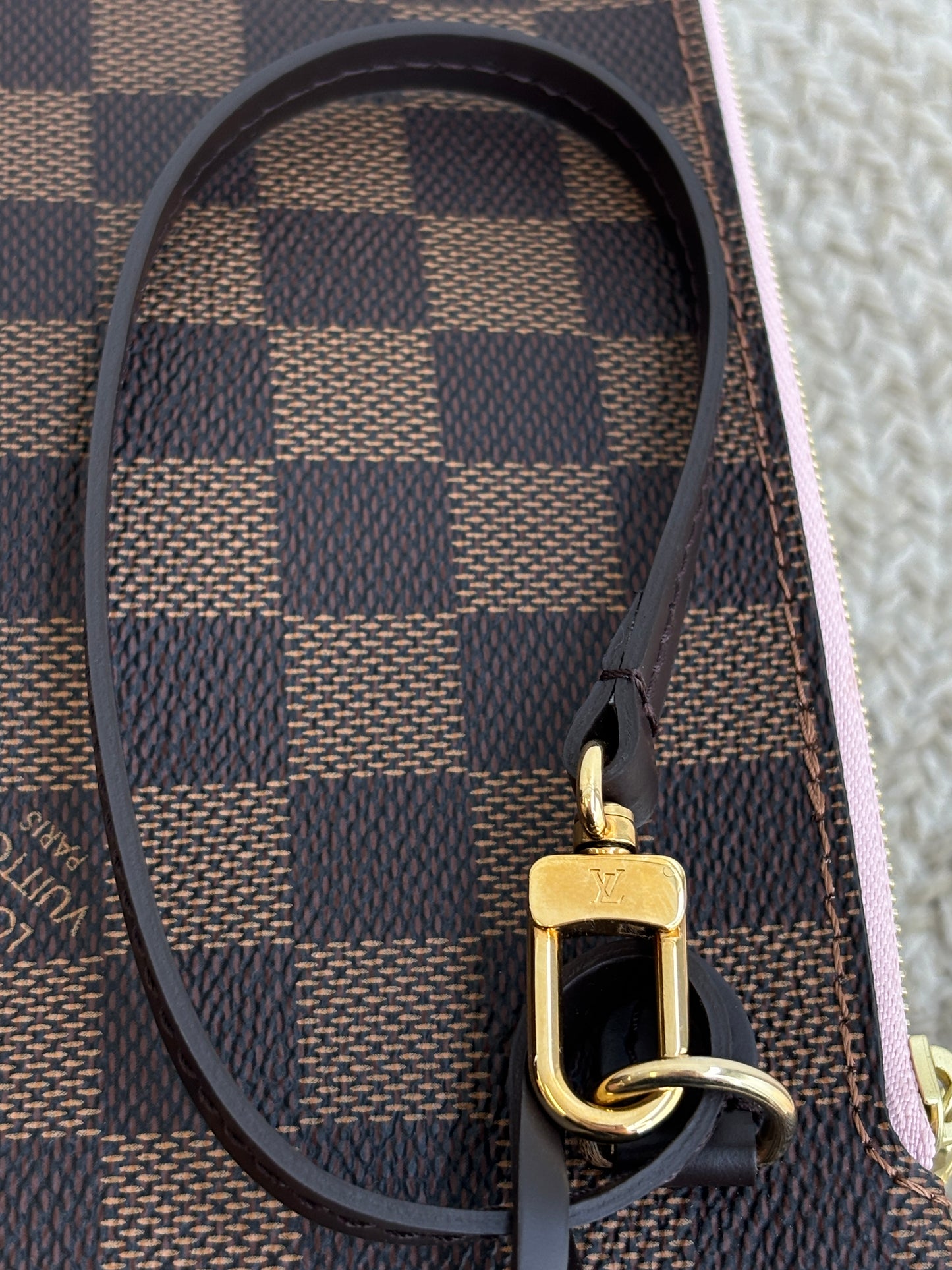 Louis Vuitton Neverfull Clutch