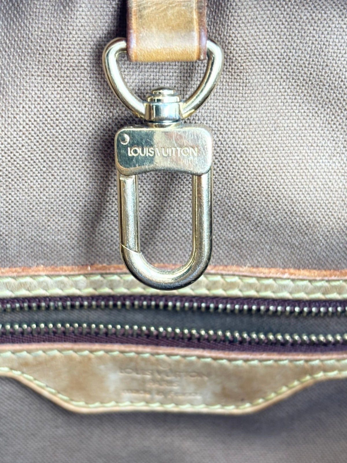 LV Batignolles Vertical monogram tote open top, showing spacious interior and canvas lining