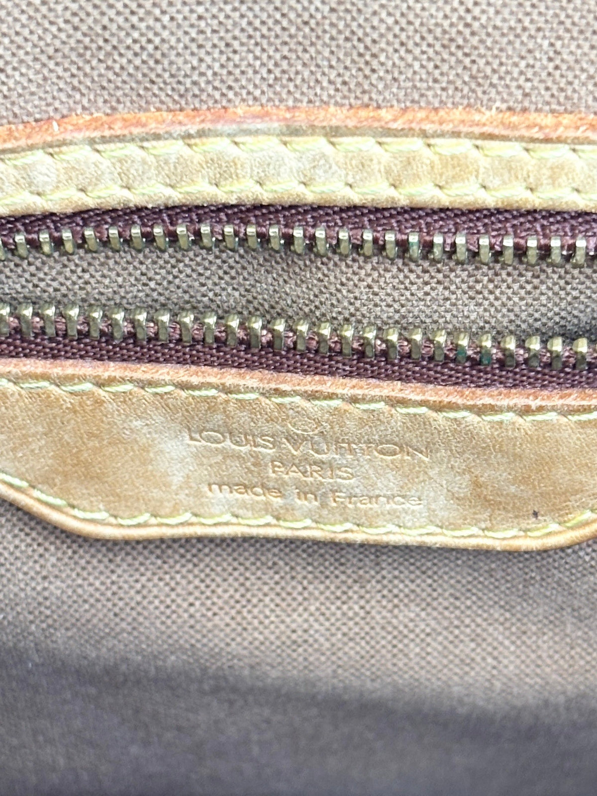 Louis Vuitton Batignolles Vertical authentic monogram tote, three-quarter view emphasising structured shape