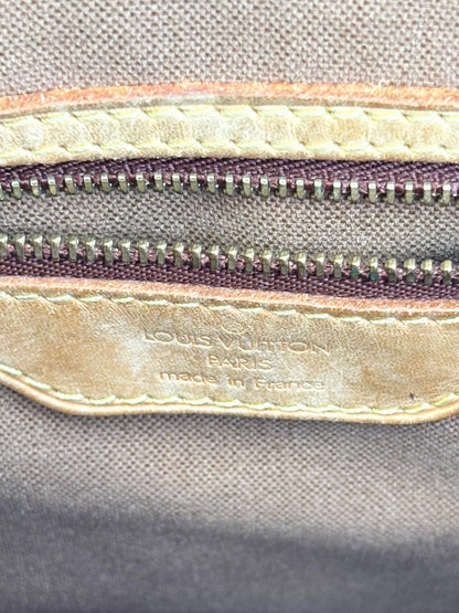 Louis Vuitton Batignolles Vertical authentic monogram tote, three-quarter view emphasising structured shape