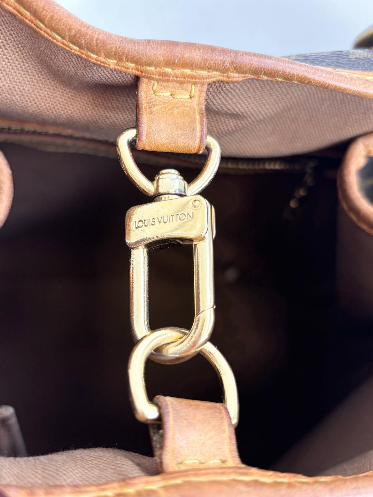 Louis Vuitton Batignolles Vertical tote back view, monogram canvas with leather base
