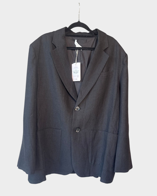 Lula and Mimi AERE oversized black linen blazer with original tags attached hanging on a black hanger