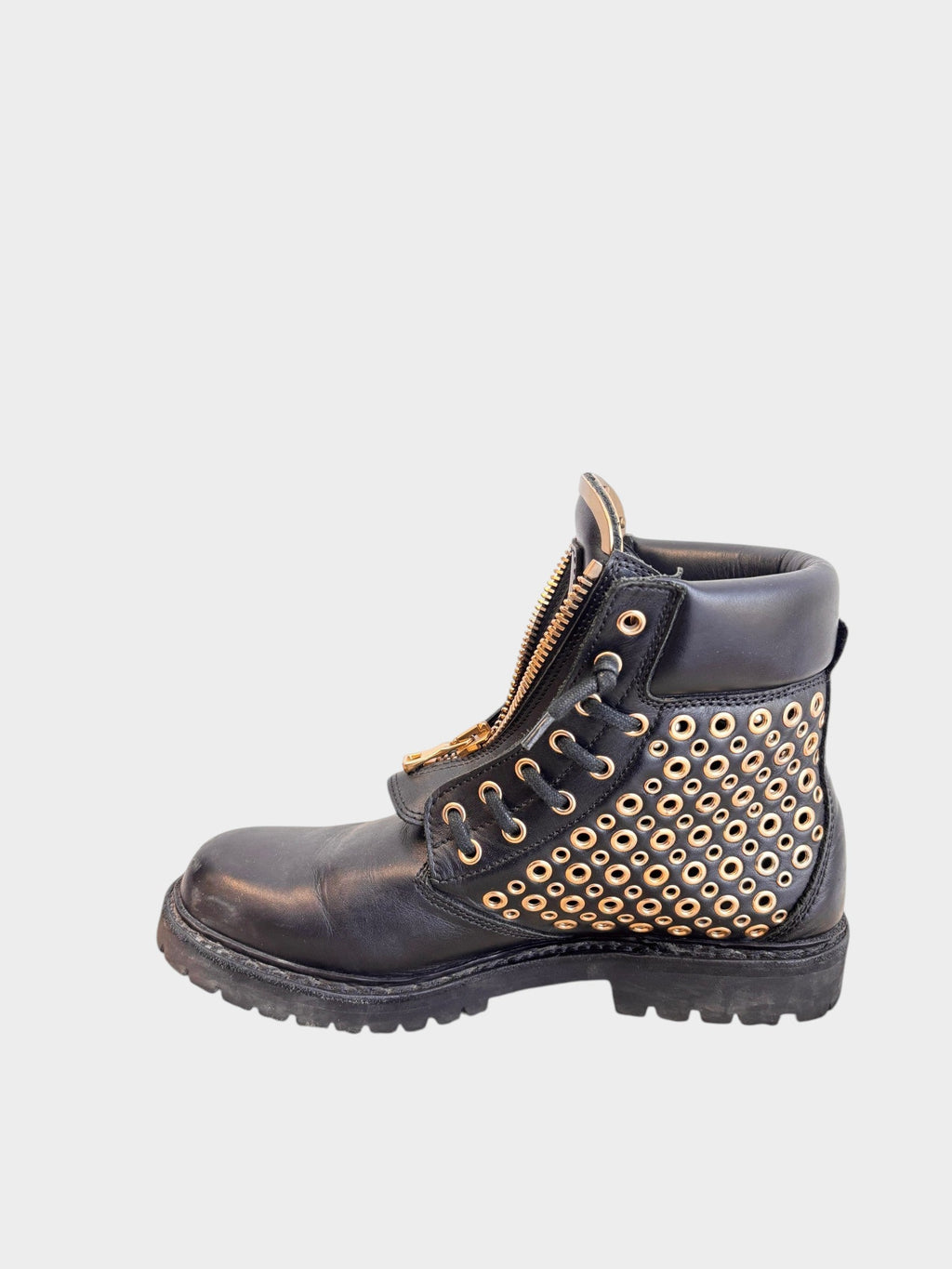 Lula and Mimi black leather army boots featuring gold-tone metal eyelet studs and a front zip closure.