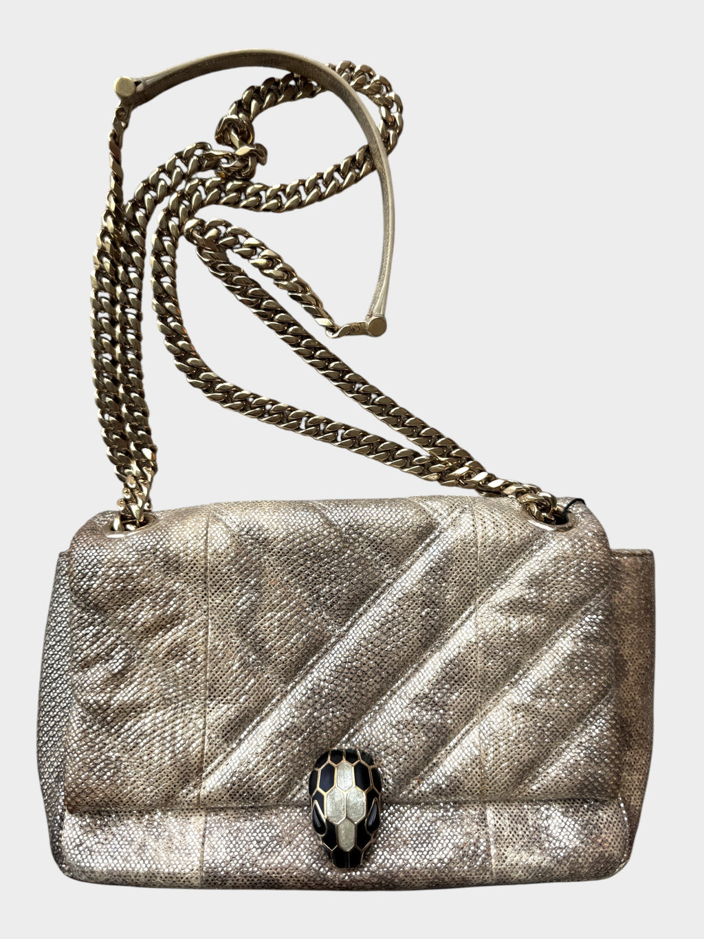 Lula and Mimi Bvlgari Serpenti Cabochon small shoulder bag in metallic Milky Opal Beige karung skin with snake clasp.