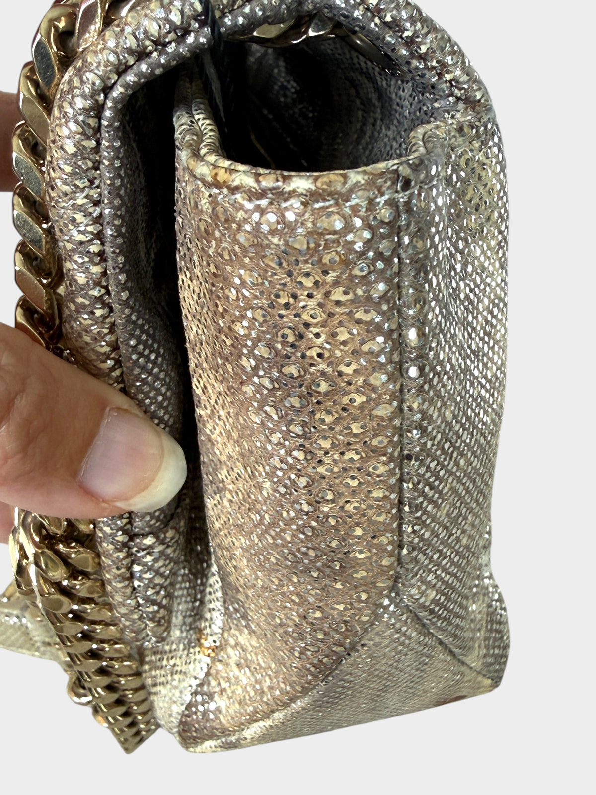 Lula and Mimi Bvlgari Serpenti Cabochon small shoulder bag in metallic milky opal beige karung skin side view