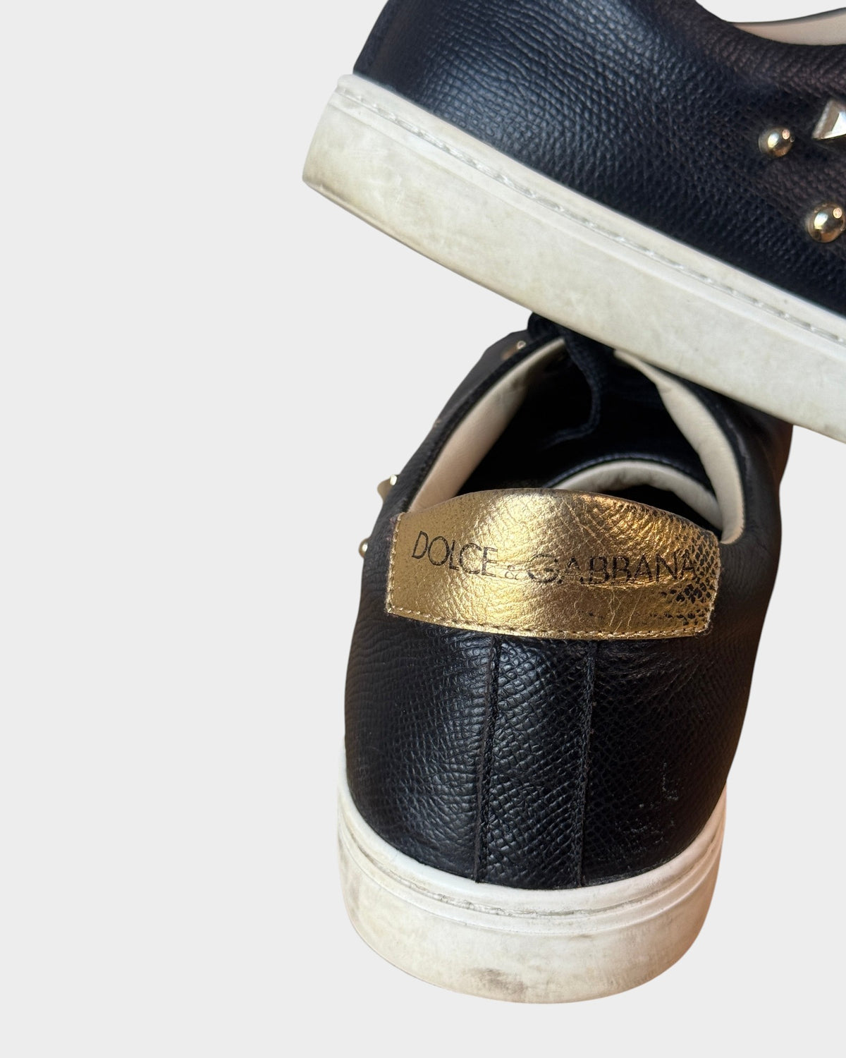 Lula and Mimi Dolce & Gabbana Portofino black leather sneakers with gold metallic heel tab and white rubber soles