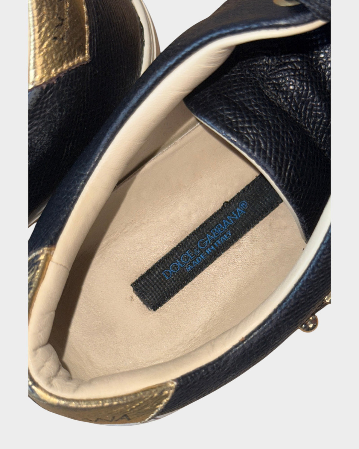 Lula and Mimi Dolce & Gabbana Portofino sneaker interior showing black leather and branded insole