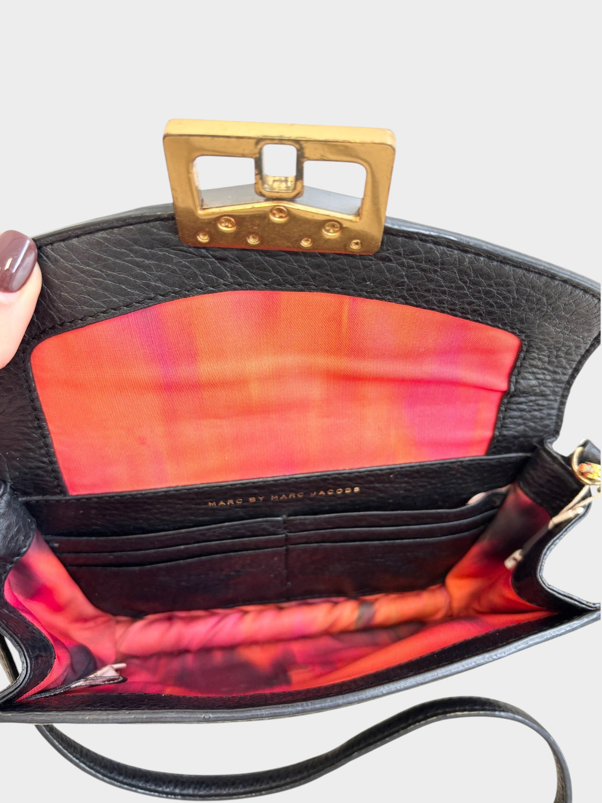 Lula and Mimi Marc Jacobs Bianca Jane black leather crossbody bag with gold hardware and vibrant pink interior lining