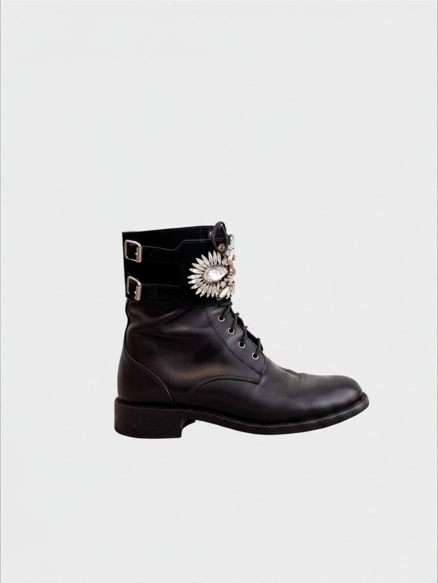 Lula and Mimi preloved black leather René Caovilla combat boots featuring a crystal-embellished suede cuff and buckles.