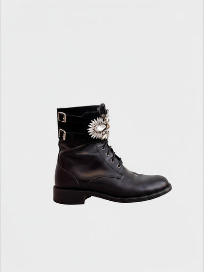 Lula and Mimi preloved black leather René Caovilla combat boots featuring a crystal-embellished suede cuff and buckles.