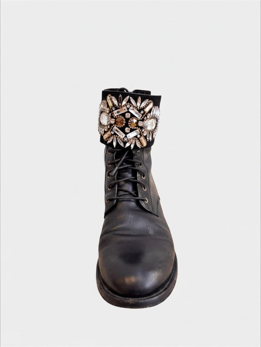Lula and Mimi Rene Caovilla black leather moto boots featuring a crystal-embellished cuff and lace-up front.