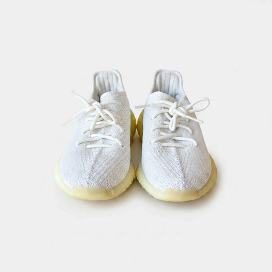 Lula and Mimi Adidas x Yeezy Boost 350 V2 trainers in cream white with a knit upper and lace-up front