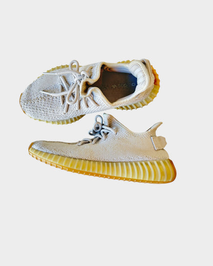 Lula and Mimi Adidas x Yeezy Boost 350 V2 Sesame sneakers in beige Primeknit with signature ribbed gum soles