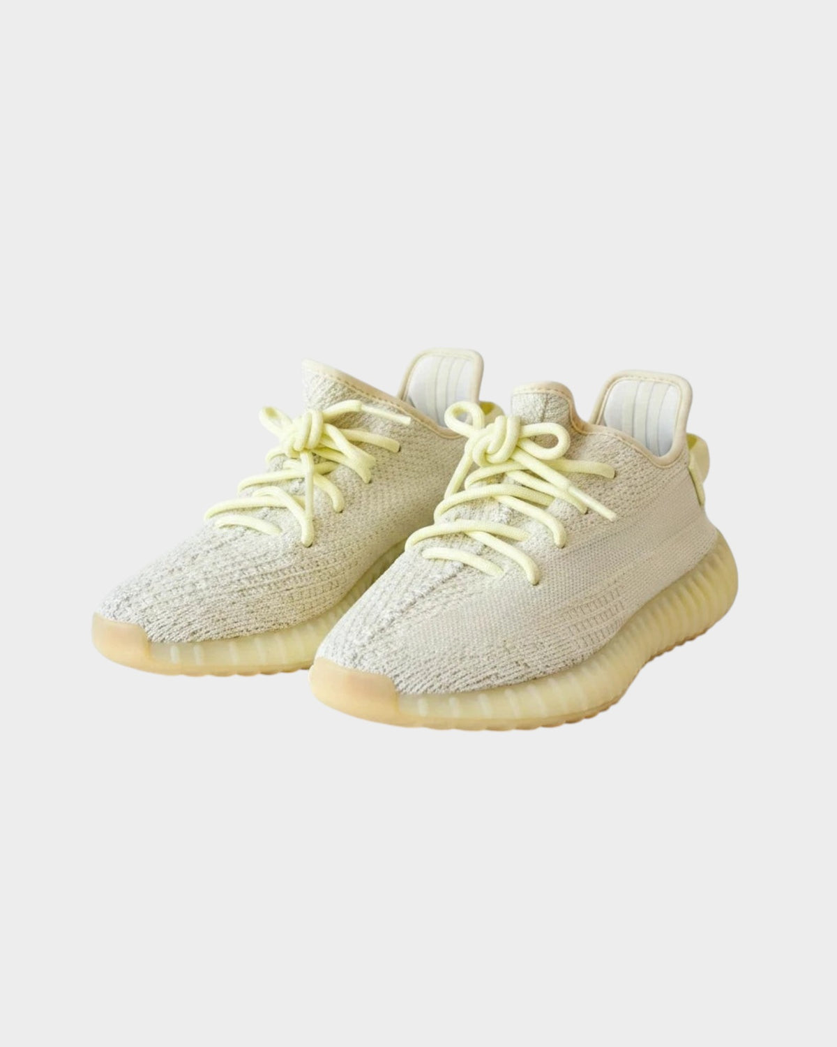 Lula and Mimi Adidas x Yeezy Boost 350 V2 Butter trainers in pale yellow knit fabric with matching laces