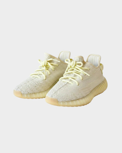 Lula and Mimi Adidas x Yeezy Boost 350 V2 Butter trainers in pale yellow knit fabric with matching laces