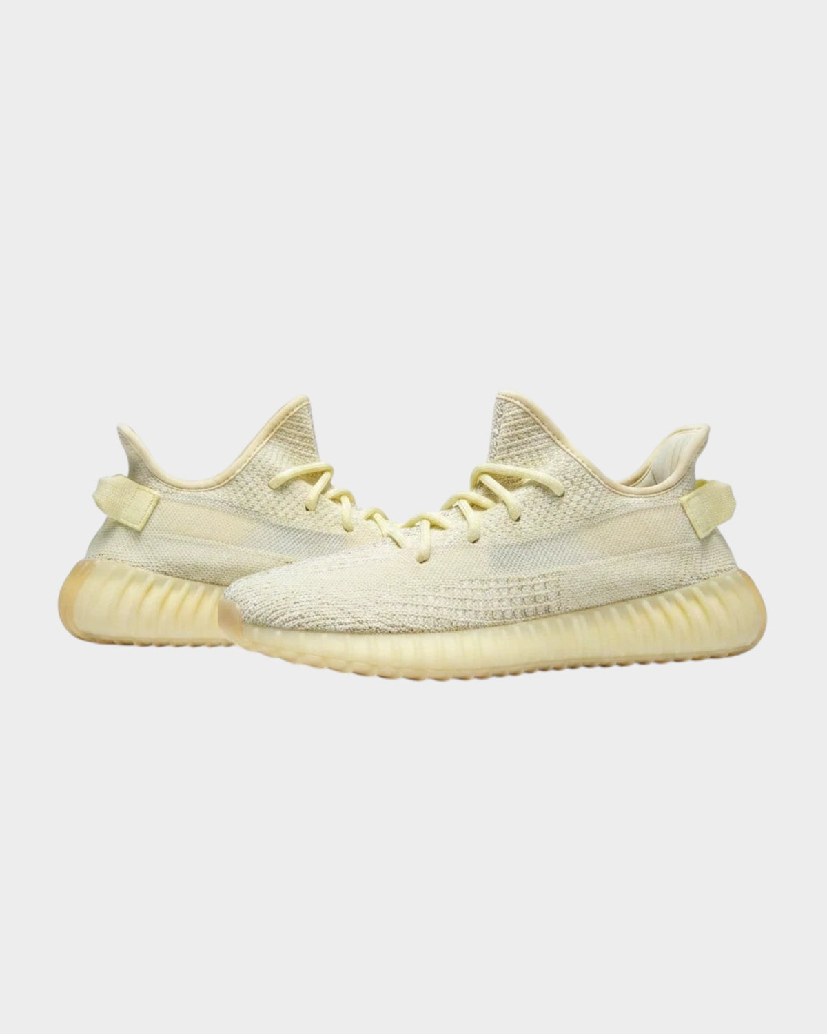 Lula and Mimi Adidas x Yeezy Boost 350 V2 Butter trainers in pale yellow knit with signature ribbed rubber soles