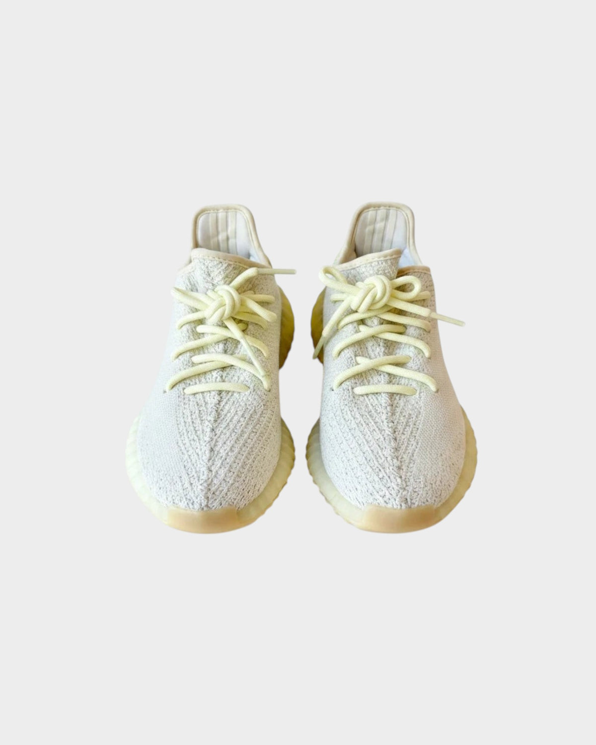Lula and Mimi Adidas x Yeezy Boost 350 V2 Butter trainers in pale yellow knit fabric with matching laces