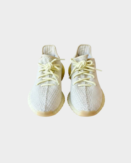 Lula and Mimi Adidas x Yeezy Boost 350 V2 Butter trainers in pale yellow knit fabric with matching laces